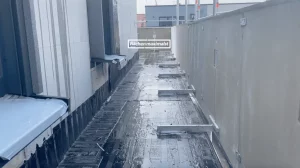 Construction site showing parapet system installation