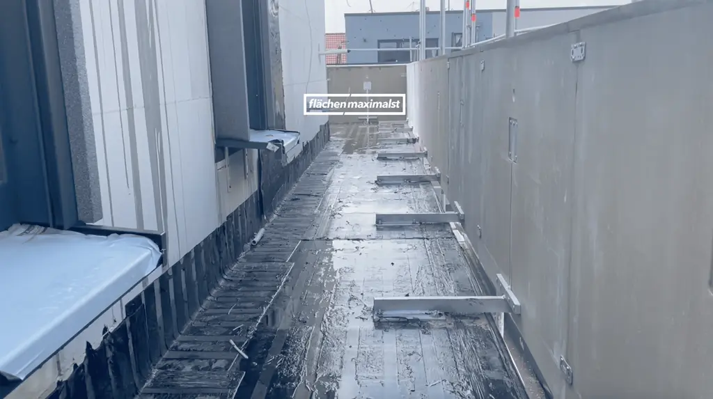 Construction site showing parapet system installation