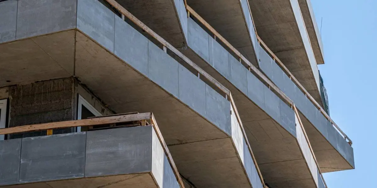 Solid concrete balustrade wall on modern apartment balconies